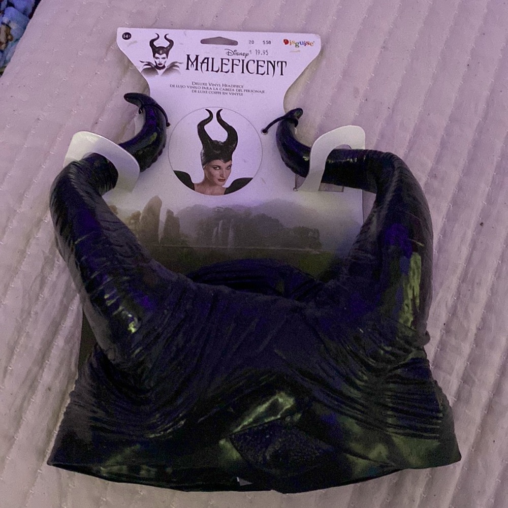 The brand is Disguise by Disney. It’s a halloween headpiece